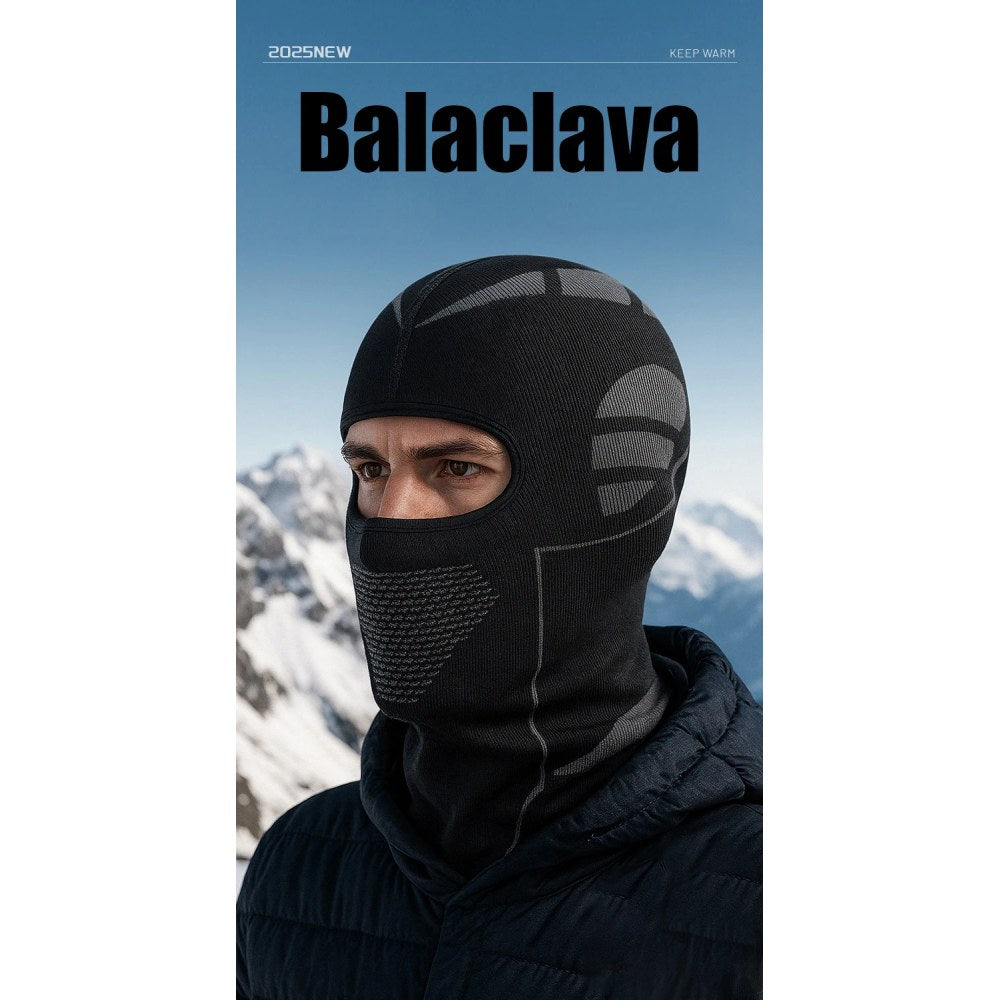 Man wearing the black balaclava outdoors in front of snowy mountains