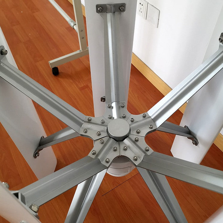Looking down at the H12 rotor hub: five bolted aluminium struts radiating from the centre shaft to the vertical blades - representative family photo