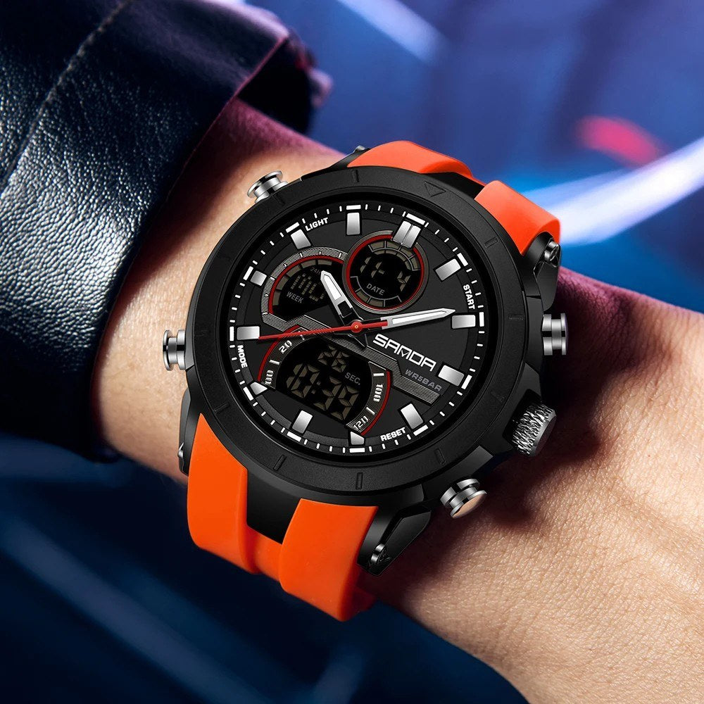SANDA 6279 watch in orange worn on a wrist, showing its size against a forearm