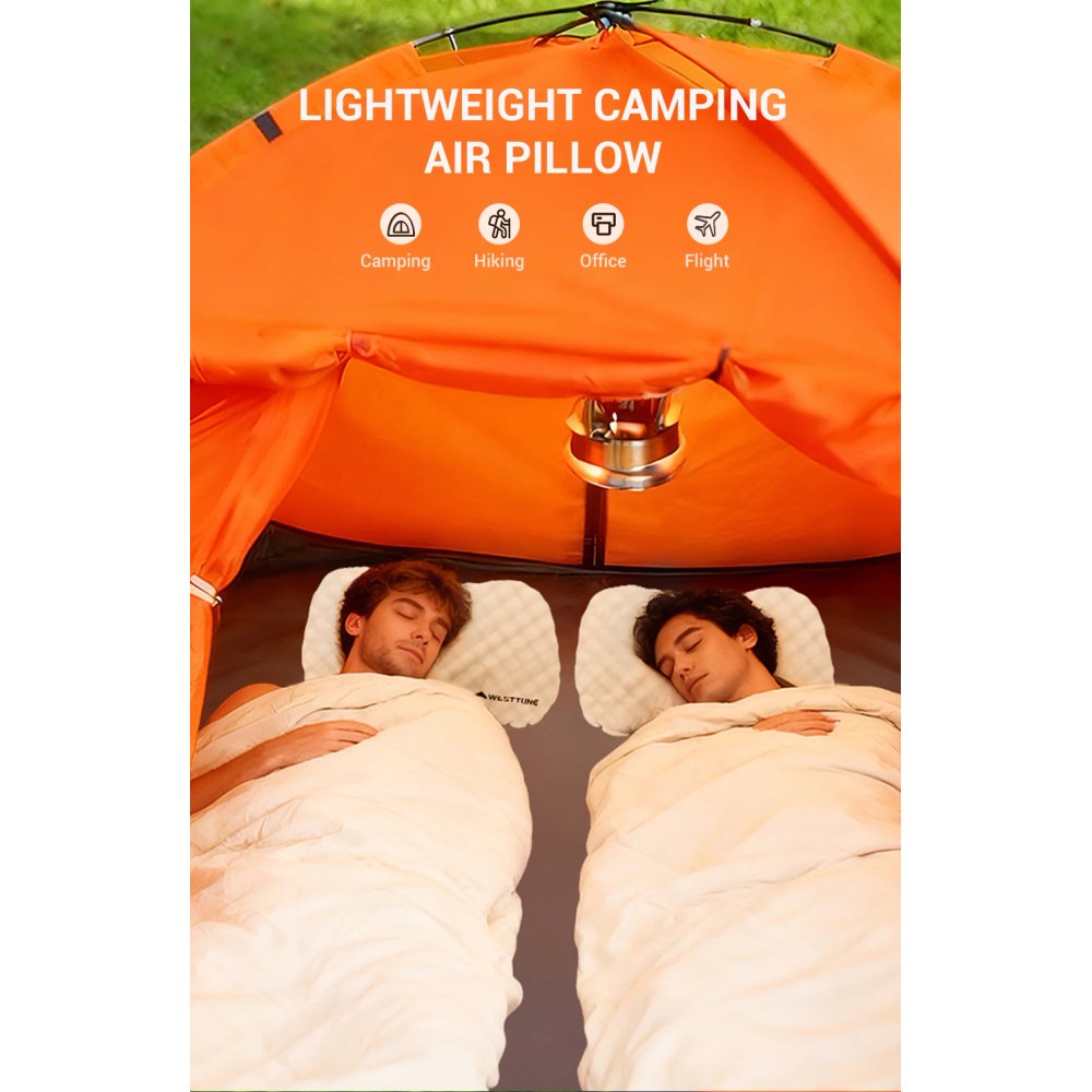 Two campers asleep in a tent, each on an off-white inflatable pillow