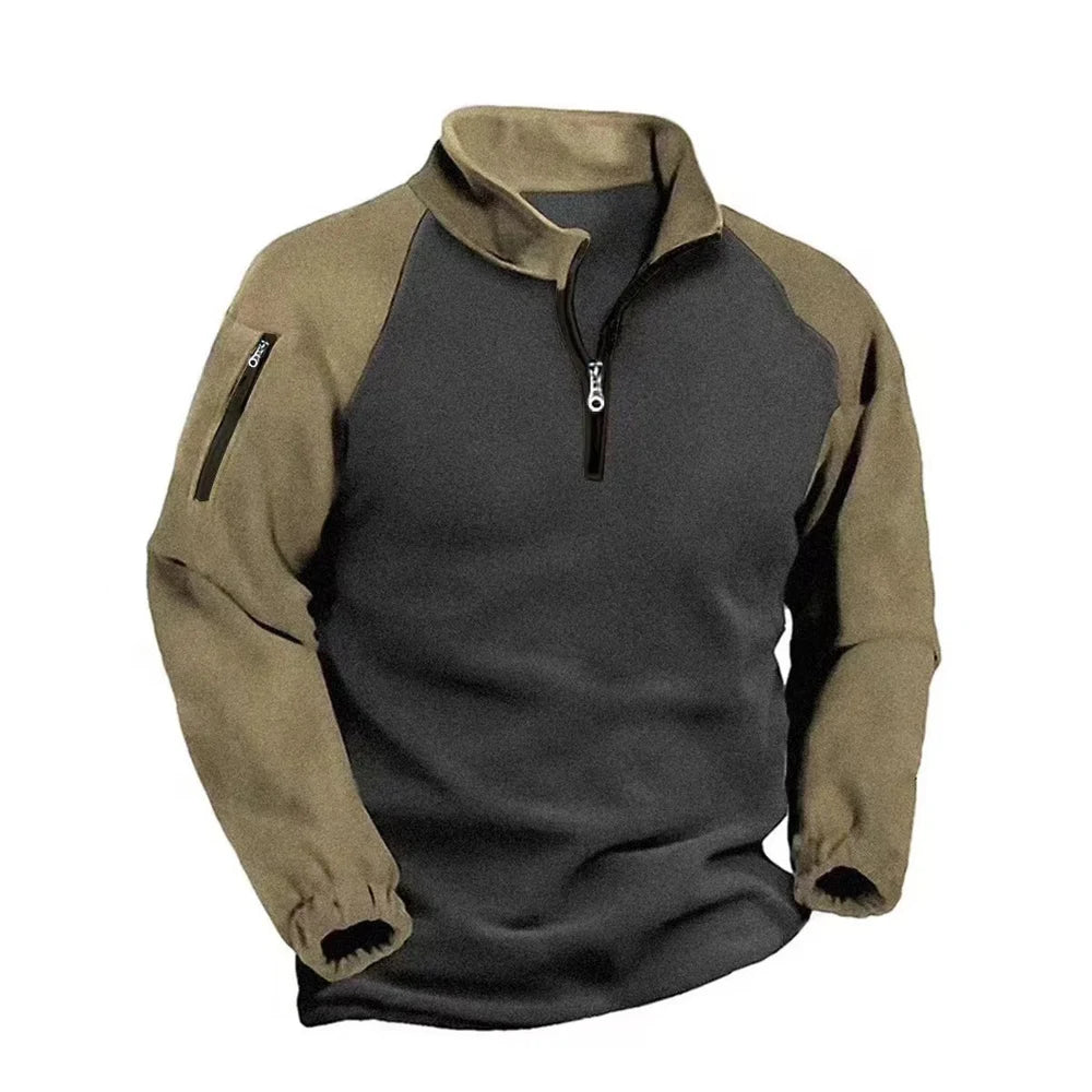 Half-zip fleece pullover with khaki sleeves and collar on a charcoal body, zipped sleeve pocket on the left arm