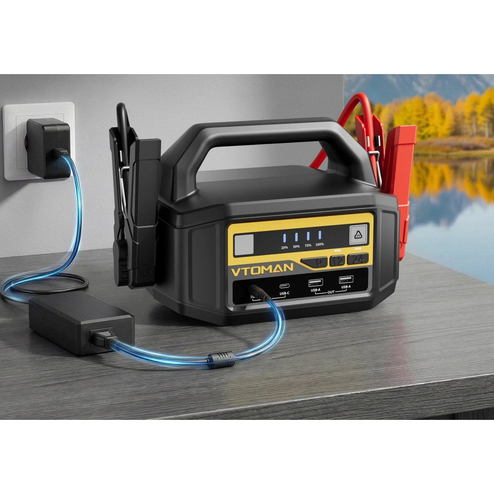 VTOMAN V-Truck jump starter charging from the wall on its supplied 145 W AC adapter