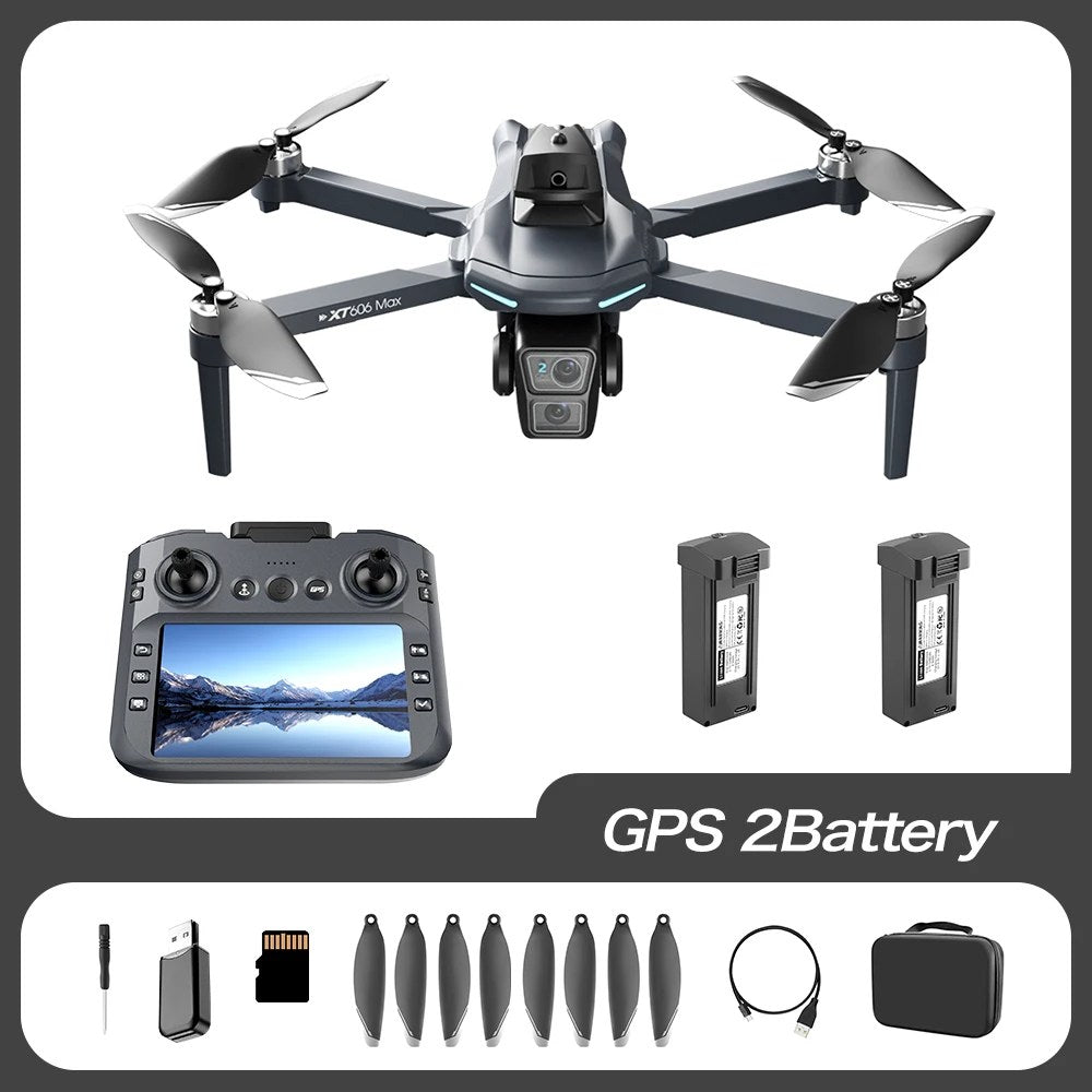 XT606 drone kit with screen remote and two batteries, plus spare propellers, USB lead, screwdriver and carry case