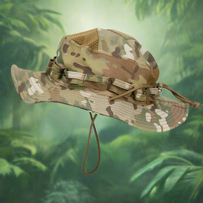 Multi-tone camouflage boonie hat side profile against a blurred green jungle background