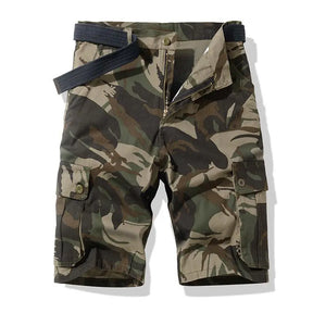 Green woodland camouflage cargo shorts flat front view with navy belt and buttoned side cargo pocket