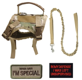 Camo vest harness with its rubber grab handle and D-ring, shown with the bungee lead and two morale patches