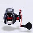 Side view of the black and red baitcast reel with its EVA paddle knob