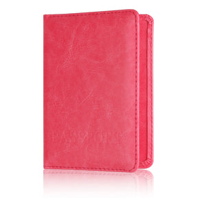 Rose red passport cover standing upright, embossed lettering just visible on the front