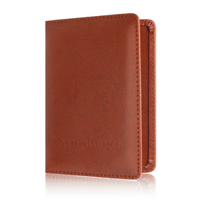 Tan brown passport cover standing upright, showing the grain finish and edge stitching