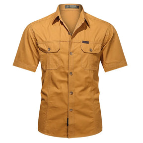 Ginger mustard shirt, front view, buttoned pocket flaps and branded chest tab