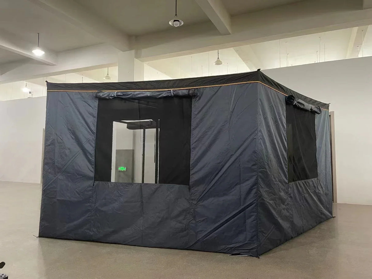 Enclosed wall panels with mesh windows zipped onto the awning indoors