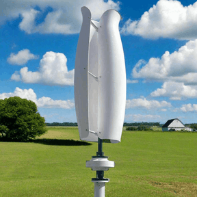 White tulip rotor on a pole above green farmland with a distant barn