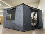 Full wall kit fitted to the awning, forming an enclosed grey room