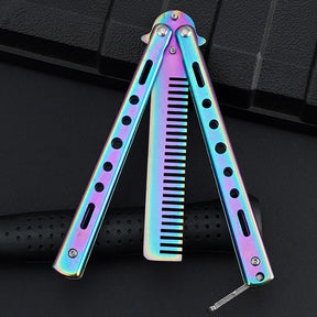 Rainbow finish butterfly comb half open in the butterfly position, handles splayed either side of the comb head