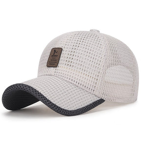 Cream beige open-mesh cap with tan EDIKO badge and dark peak binding