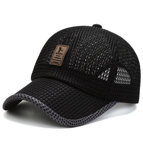 Black open-mesh cap with tan EDIKO badge and grey peak binding