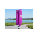 T-500W tulip vertical-axis wind turbine in purple beside a lakeside path - representative T-series family photo, not model-specific