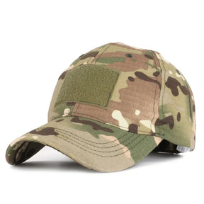 Green multi-terrain camouflage cap showing front loop panel and curved brim