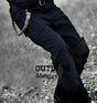 Black colourway worn outdoors with a lanyard hanging from the waistband