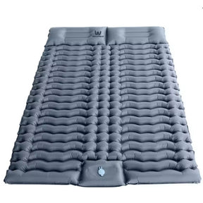 Grey double mattress viewed from above, Wonflex brand mark on the pillow