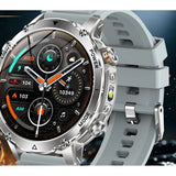 AK106 smartwatch with a light grey silicone strap