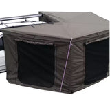 Olive-brown awning room zipped to a roof rack, mesh windows on two sides