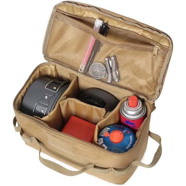 Khaki camp kitchen bag open, holding a pot set, gas canisters, a stove case and cutlery in the lid pocket