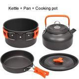 Camping pot with lid, frying pan and kettle in grey aluminium with orange handles