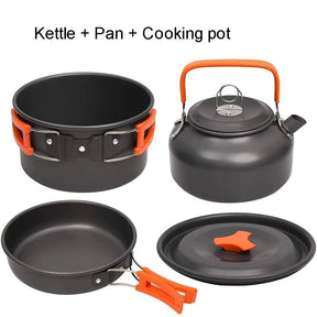 Camping pot with lid, frying pan and kettle in grey aluminium with orange handles