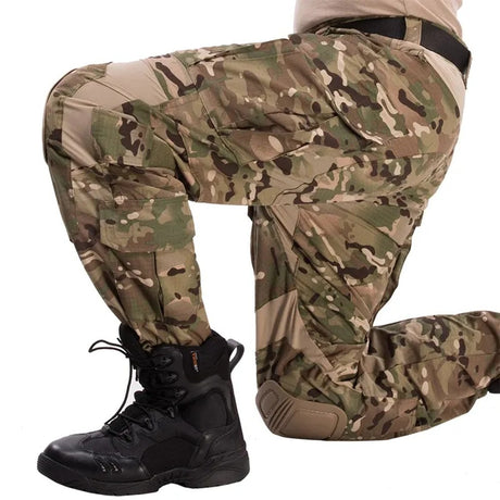 CP camouflage combat-cut trousers worn kneeling, knee pad in place