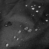 Close-up of the black 600D Oxford fabric with water droplets beading on the surface