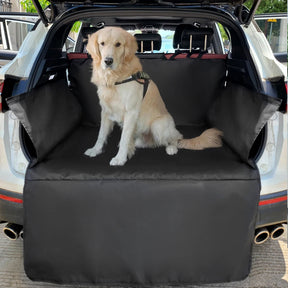 Golden retriever in a harness sitting on the black-edged cargo liner fitted in the back of a white SUV, bumper flap down