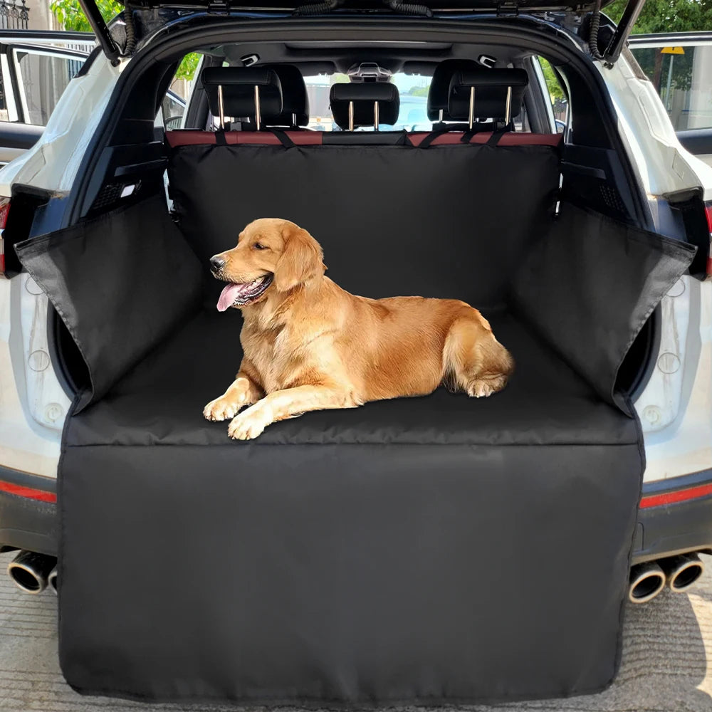 Golden retriever lying down on the black cargo liner in the back of an SUV with the side flaps and bumper flap in place