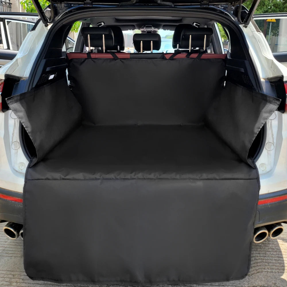 Empty black cargo liner fitted in an SUV: back panel hung from the rear headrests, side flaps up the walls, bumper flap down