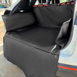 Side view of the fitted cargo liner showing the side flap, the floor and the bumper flap hanging over the rear bumper
