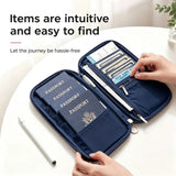 Hands sliding a ticket into the open wallet holding four passports and a pen