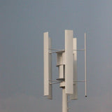 H2000 vertical axis wind turbine on a tall white mast against an overcast sky