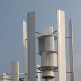 Close-up of the H2000 rotor — tall white aluminium blades around the drum-shaped assist wind wheel