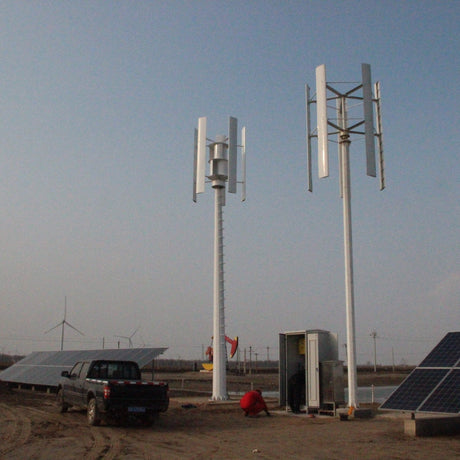 H2000 with its centre assist wheel (left) beside a different turbine model, a solar array and a site vehicle
