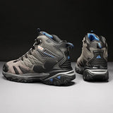 Pair of grey HIKEUP boots from the side and back, showing the moulded heel piece and tongue pull loop
