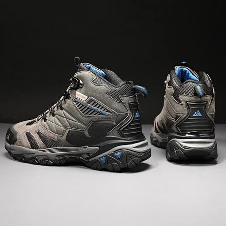 Pair of grey HIKEUP boots from the side and back, showing the moulded heel piece and tongue pull loop
