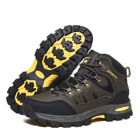 Pair of army green lace-up hiking boots with black trim and a yellow-and-black rubber lug sole