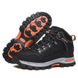 Pair of black lace-up hiking boots with orange heel inset and an orange-and-black rubber lug sole