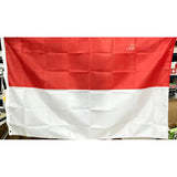 Indonesian flag in printed polyester held up indoors: red over white, white header strip at left