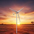 Three-blade horizontal-axis wind turbine on a white pole against an outback sunset over red earth and dry grass - representative L-series photo.