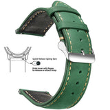 Dark green waxed leather band with cream stitching and a silver buckle