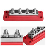 Red four-post bus bar from above with close-ups of two studs and the small screw terminals at the end of the bar