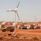 M5-800 turbines powering a remote red-dirt camp - pole mount beside utes, containers and generator sheds