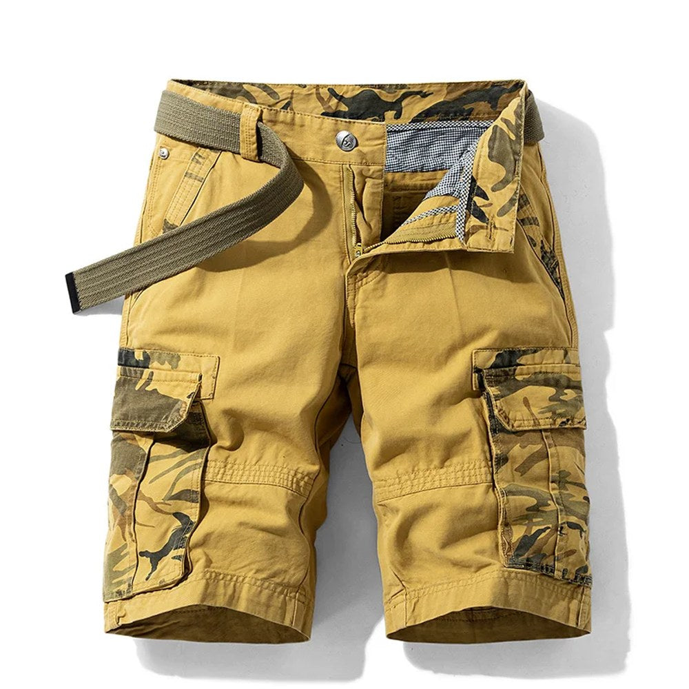 Men's cargo shorts in Khaki: mustard-tan cotton with camo pocket facings and fly, laid flat with a webbing belt