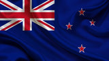 Close rippled view of the New Zealand flag, Union Jack and four red stars